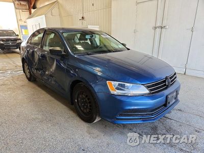Czwarte zdjęcie samochodu z boku: 2016 VOLKSWAGEN JETTA S VIN:3VW267AJ5GM218317 - miniatura