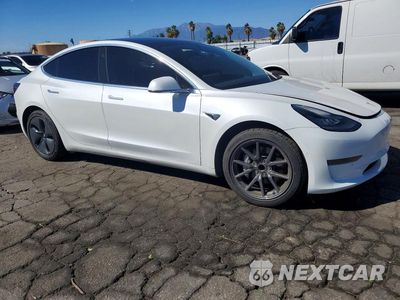 Czwarte zdjęcie samochodu z boku: 2020 TESLA MODEL 3 VIN:5YJ3E1EA8LF660511 - miniatura