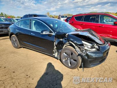 Czwarte zdjęcie samochodu z boku: 2018 TESLA MODEL 3 VIN:5YJ3E1EB6JF068160 - miniatura