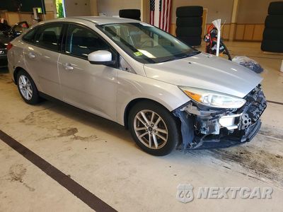 Czwarte zdjęcie samochodu z boku: 2018 FORD FOCUS SE VIN:1FADP3F24JL213899 - miniatura