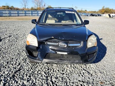 Piąte zdjęcie samochodu w środku: 2009 KIA SPORTAGE LX VIN:KNDJE723897628317 - miniatura