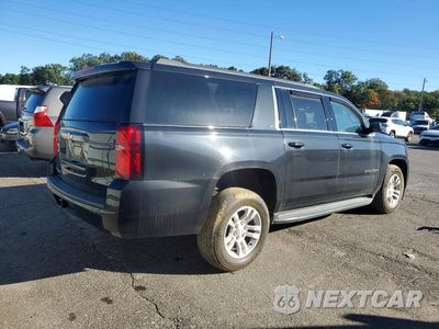 Trzecie zdjęcie samochodu z tyłu: 2020 CHEVROLET SUBURBAN K1500 LT VIN:1GNSKHKC2LR121757 - miniatura