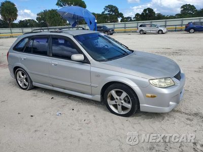 Czwarte zdjęcie samochodu z boku: 2002 MAZDA PROTEGE PR5 VIN:JM1BJ245621616032 - miniatura