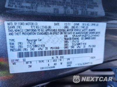 Zdjęcie 12 z 12 samochodu: 2012 FORD FOCUS TITANIUM VIN:1FAHP3N27CL314943 - miniatura