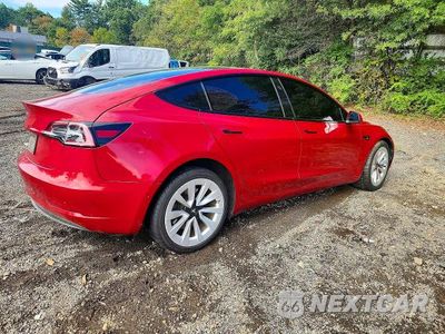 Trzecie zdjęcie samochodu z tyłu: 2022 TESLA MODEL 3 VIN:5YJ3E1EAXNF370418 - miniatura