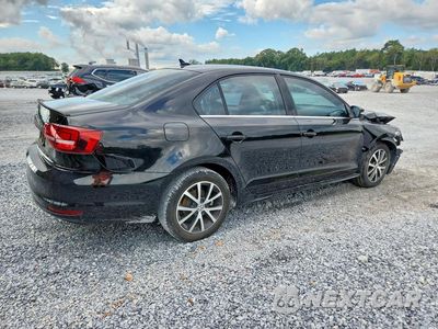 Trzecie zdjęcie samochodu z tyłu: 2017 VOLKSWAGEN JETTA SE VIN:3VWDB7AJ4HM218508 - miniatura