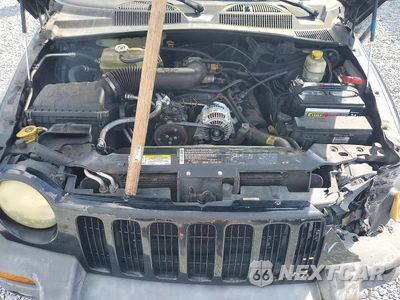 Zdjęcie 12 z 13 samochodu: 2004 JEEP LIBERTY SPORT VIN:1J4GL48KX4W255254 - miniatura