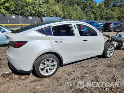 Trzecie zdjęcie samochodu z tyłu: 2022 TESLA MODEL Y VIN:7SAYGDEE0NF374968 - miniatura