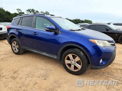 Czwarte zdjęcie samochodu z boku: 2014 TOYOTA RAV4 XLE VIN:2T3WFREV5EW129730 - miniatura