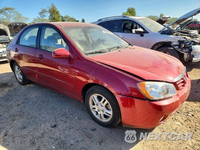 Czwarte zdjęcie samochodu z boku: 2003 KIA SPECTRA BASE VIN:KNAFB121135266860 - miniatura