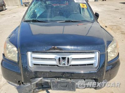Zdjęcie 12 z 13 samochodu: 2007 HONDA PILOT EXL VIN:2HKYF18677H528700 - miniatura
