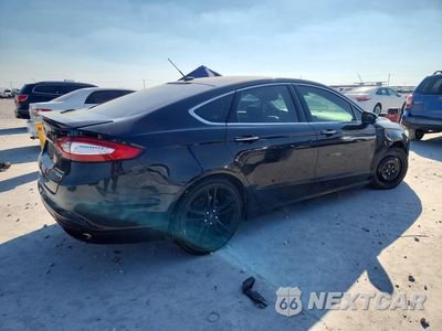 Trzecie zdjęcie samochodu z tyłu: 2015 FORD FUSION TITANIUM VIN:3FA6P0K96FR104394 - miniatura