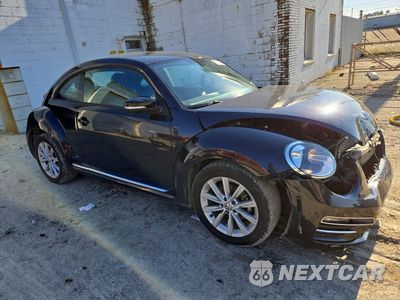 Czwarte zdjęcie samochodu z boku: 2017 VOLKSWAGEN BEETLE SE VIN:3VWJ17AT7HM610096 - miniatura