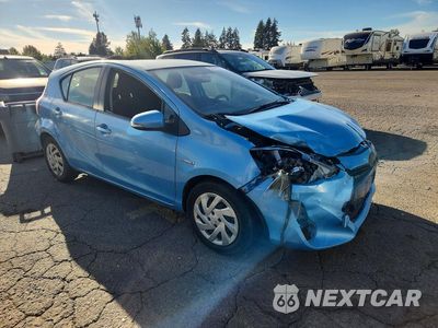 Czwarte zdjęcie samochodu z boku: 2015 TOYOTA PRIUS C TWO VIN:JTDKDTB32F1114820 - miniatura