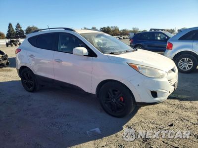 Czwarte zdjęcie samochodu z boku: 2011 HYUNDAI TUCSON GLS VIN:KM8JU3AC2BU285990 - miniatura