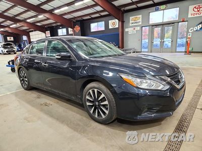 Czwarte zdjęcie samochodu z boku: 2018 NISSAN ALTIMA 2.5 SL VIN:1N4AL3AP4JC150966 - miniatura