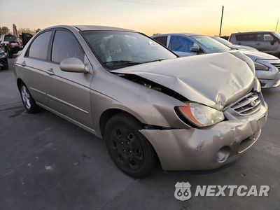 Czwarte zdjęcie samochodu z boku: 2006 KIA SPECTRA EX VIN:KNAFE121765233714 - miniatura