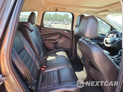 Zdjęcie 11 z 13 samochodu: 2017 FORD ESCAPE TITANIUM VIN:1FMCU0J92HUA57508 - miniatura