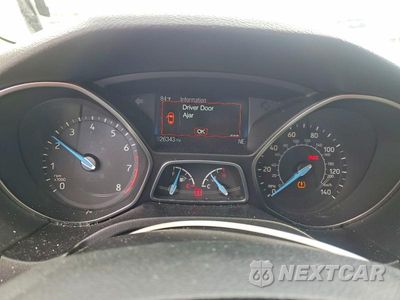Zdjęcie 9 z 12 samochodu: 2018 FORD FOCUS SE VIN:1FADP3FE3JL307492 - miniatura