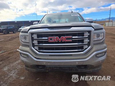 Piąte zdjęcie samochodu w środku: 2017 GMC SIERRA K1500 SLT VIN:3GTU2NEC0HG320390 - miniatura