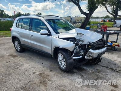 Czwarte zdjęcie samochodu z boku: 2017 VOLKSWAGEN TIGUAN S VIN:WVGAV7AX3HK046461 - miniatura