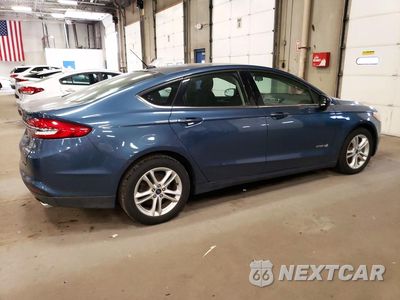Trzecie zdjęcie samochodu z tyłu: 2018 FORD FUSION SE HYBRID VIN:3FA6P0LU8JR281136 - miniatura