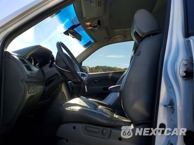 Zdjęcie 7 z 14 samochodu: 2006 HONDA PILOT EX VIN:2HKYF18586H509241 - miniatura