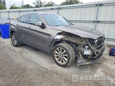 Czwarte zdjęcie samochodu z boku: 2018 BMW X6 SDRIVE35I VIN:5UXKU0C5XJ0G69531 - miniatura