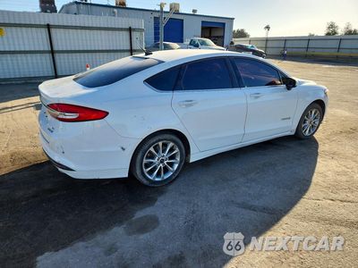 Trzecie zdjęcie samochodu z tyłu: 2017 FORD FUSION SE HYBRID VIN:3FA6P0LU6HR387868 - miniatura
