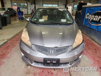 Piąte zdjęcie samochodu w środku: 2009 HONDA FIT SPORT VIN:JHMGE88469S008674 - miniatura