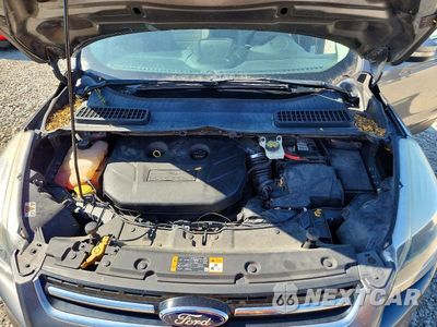 Zdjęcie 11 z 12 samochodu: 2014 FORD ESCAPE TITANIUM VIN:1FMCU0J9XEUA04339 - miniatura