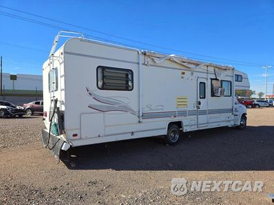Trzecie zdjęcie samochodu z tyłu: 1998 FORD ECONOLINE E450 SUPER DUTY CUTAWAY VAN RV VIN:1FDXE40S1WHA20868 - miniatura