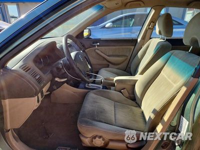 Zdjęcie 7 z 12 samochodu: 2003 HONDA CIVIC LX VIN:1HGES16663L029329 - miniatura