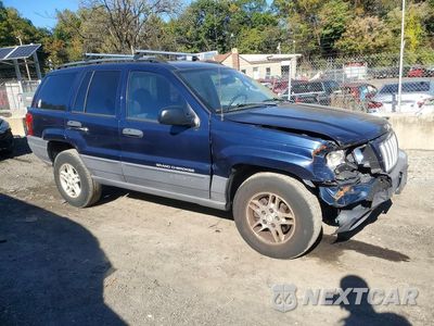 Czwarte zdjęcie samochodu z boku: 2004 JEEP GRAND CHEROKEE LAREDO VIN:1J4GW48N84C411603 - miniatura
