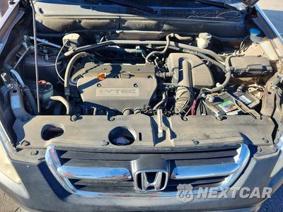 Zdjęcie 11 z 12 samochodu: 2003 HONDA CR-V LX VIN:JHLRD68463C013489 - miniatura