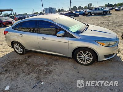 Czwarte zdjęcie samochodu z boku: 2015 FORD FOCUS SE VIN:1FADP3F25FL257191 - miniatura
