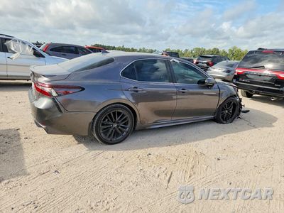 Trzecie zdjęcie samochodu z tyłu: 2022 TOYOTA CAMRY HYBRID SE VIN:4T1G31AK2NU592069 - miniatura