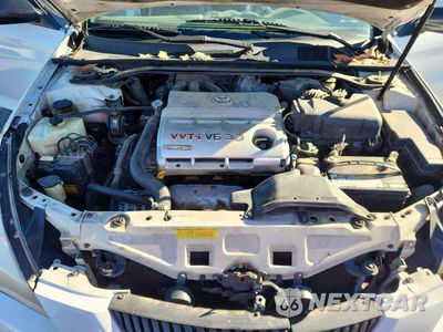 Zdjęcie 11 z 12 samochodu: 2004 TOYOTA CAMRY SOLARA SLE V6 VIN:4T1FA38P84U026513 - miniatura