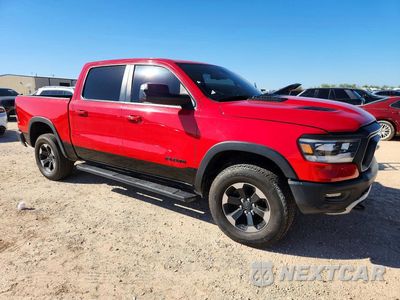 Czwarte zdjęcie samochodu z boku: 2019 RAM 1500 REBEL VIN:1C6RRELT8KN724225 - miniatura