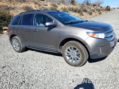 Czwarte zdjęcie samochodu z boku: 2014 FORD EDGE LIMITED VIN:2FMDK4KC2EBA26028 - miniatura