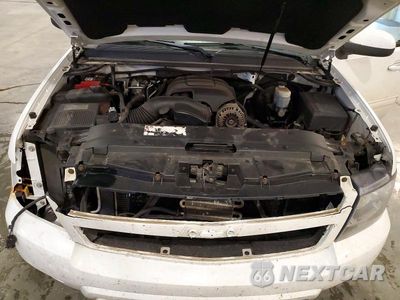 Zdjęcie 12 z 13 samochodu: 2012 CHEVROLET SUBURBAN K1500 LT VIN:1GNSKJE78CR176333 - miniatura