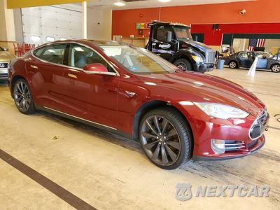 Czwarte zdjęcie samochodu z boku: 2012 TESLA MODEL S VIN:5YJSA1DP0CFS00630 - miniatura