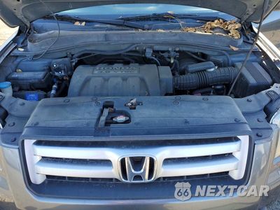 Zdjęcie 12 z 13 samochodu: 2007 HONDA PILOT EX-L VIN:2HKYF18577H511810 - miniatura