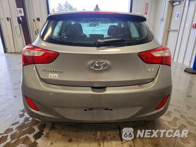 Zdjęcie 6 z 12 samochodu: 2013 HYUNDAI ELANTRA GT BASE VIN:KMHD35LE1DU030177 - miniatura