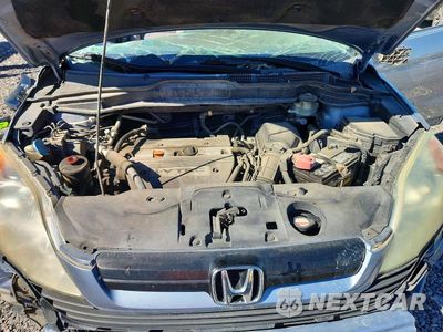 Zdjęcie 12 z 13 samochodu: 2009 HONDA CR-V LX VIN:3CZRE38379G706541 - miniatura