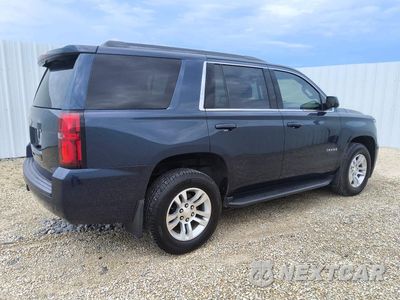 Trzecie zdjęcie samochodu z tyłu: 2019 CHEVROLET TAHOE C1500 LS VIN:1GNSCAKC0KR114969 - miniatura