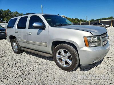 Czwarte zdjęcie samochodu z boku: 2011 CHEVROLET TAHOE C1500 LT VIN:1GNSCBE05BR112464 - miniatura