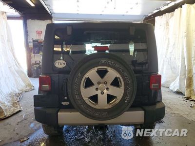 Zdjęcie 6 z 13 samochodu: 2012 JEEP WRANGLER UNLIMITED SAHARA VIN:1C4BJWEG5CL276093 - miniatura