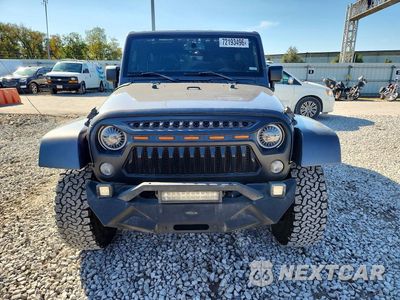 Piąte zdjęcie samochodu w środku: 2016 JEEP WRANGLER UNLIMITED SAHARA VIN:1C4BJWEG3GL153074 - miniatura