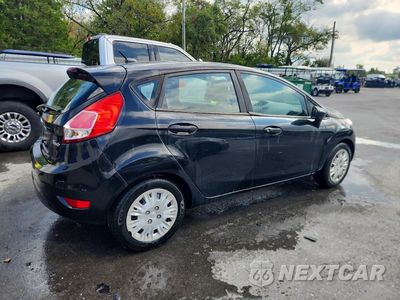 Trzecie zdjęcie samochodu z tyłu: 2014 FORD FIESTA S VIN:3FADP4TJ1EM177286 - miniatura